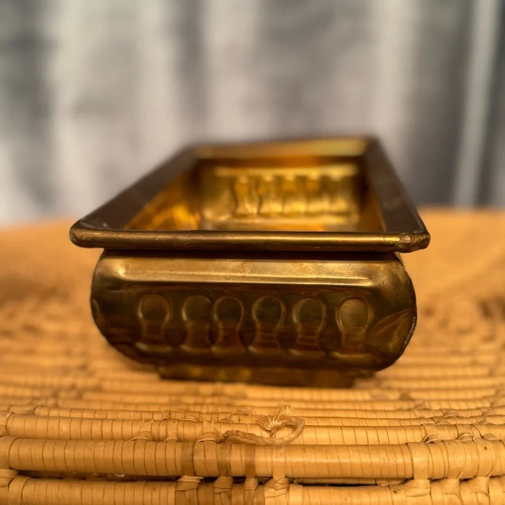 vintage brass planter, also known as a jardinière or cachepot.